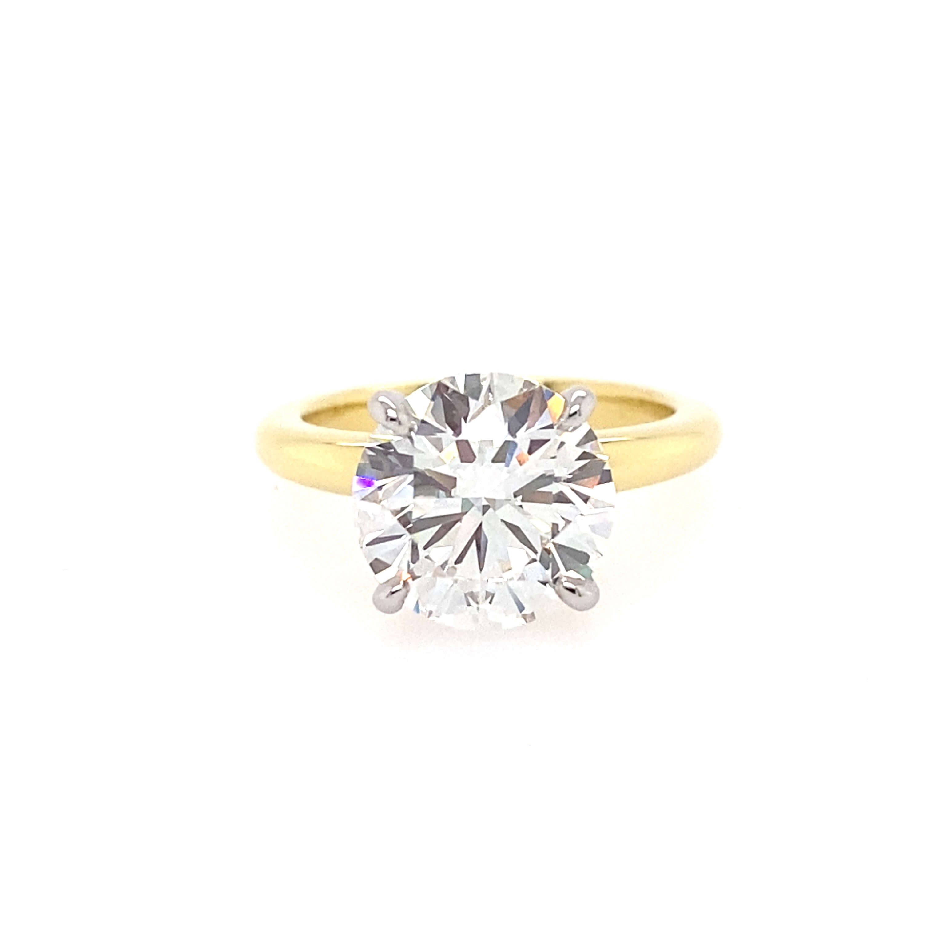 18k yg and plat solitaire ring 