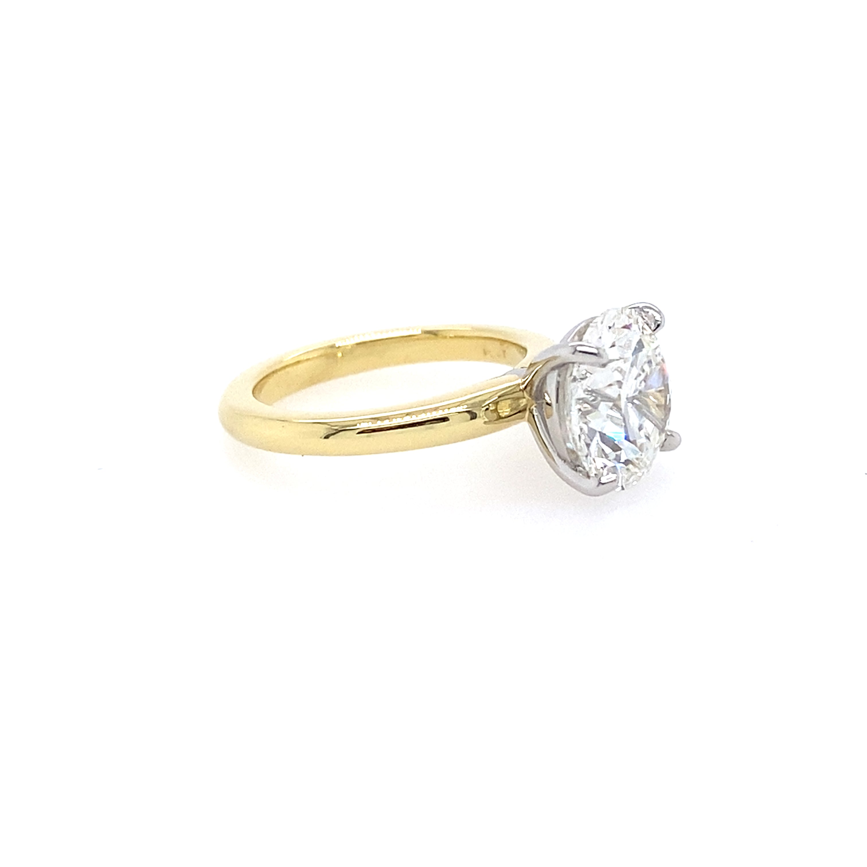 Side View 18k yg and play solitaire ring 