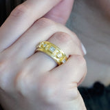 woman wearing 14K gold and diamond ring