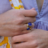 woman wearing tanzanite rings