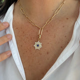 yg_diamond_sapphire_pendant_on_neck