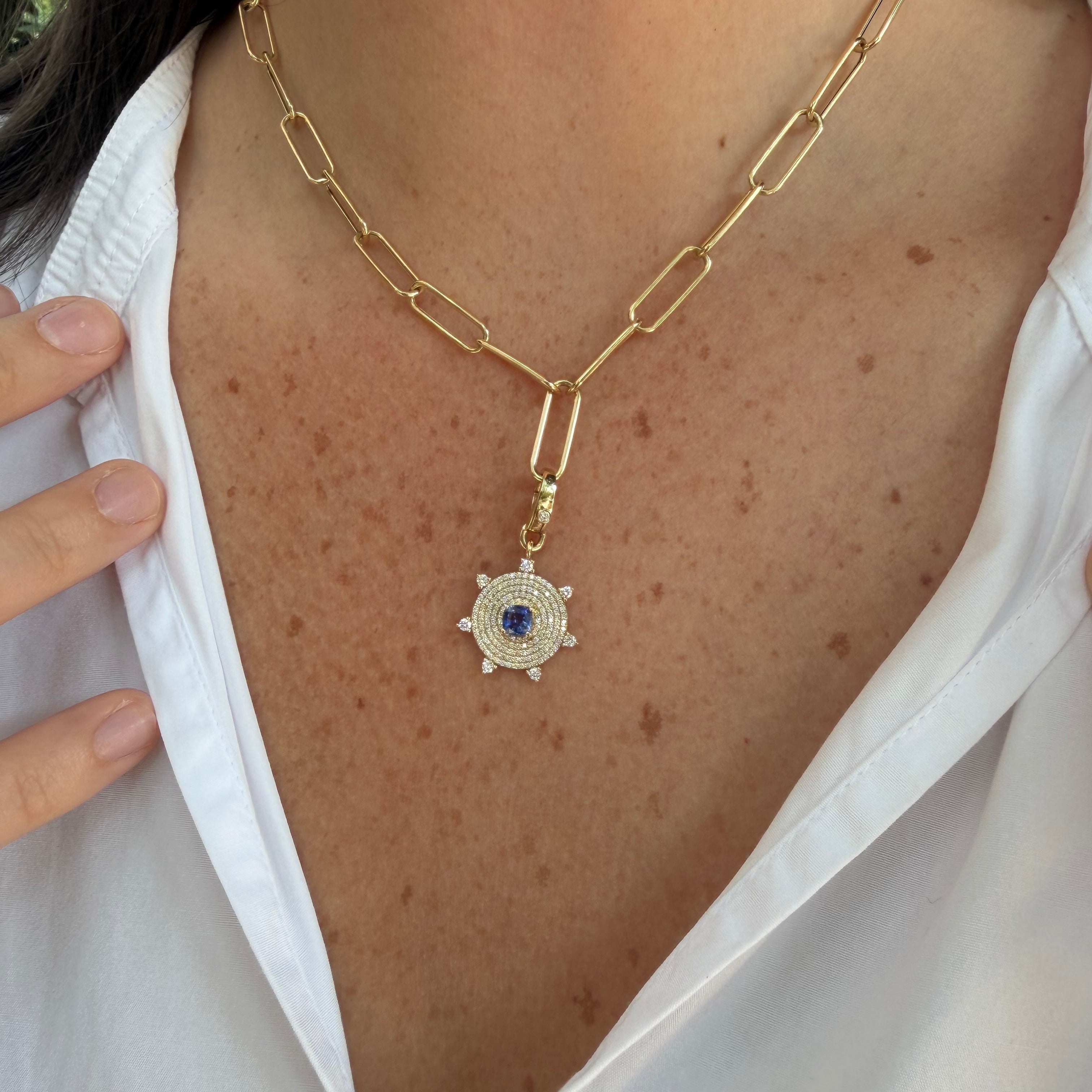 yg_diamond_sapphire_pendant_on_neck