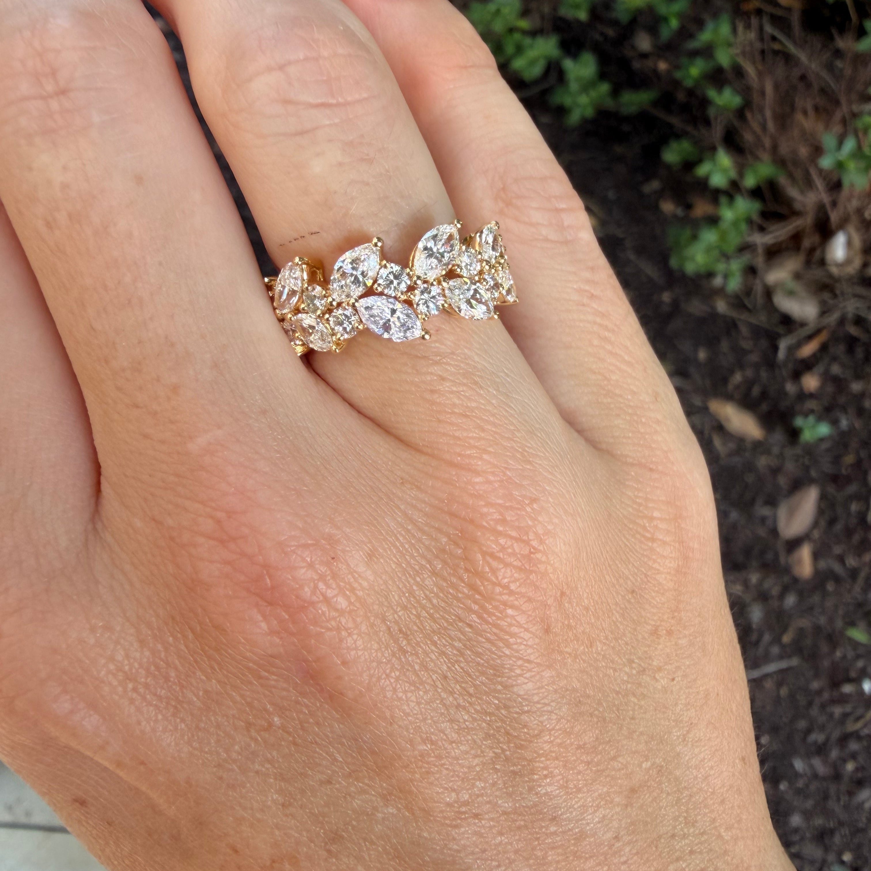 yg_round_and_marquise_diamond_ring_on_hand