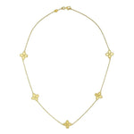 A 14K yellow gold necklace with clover station design