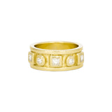 A 14K yellow gold ring with round and princess cut diamonds arranged in a band.