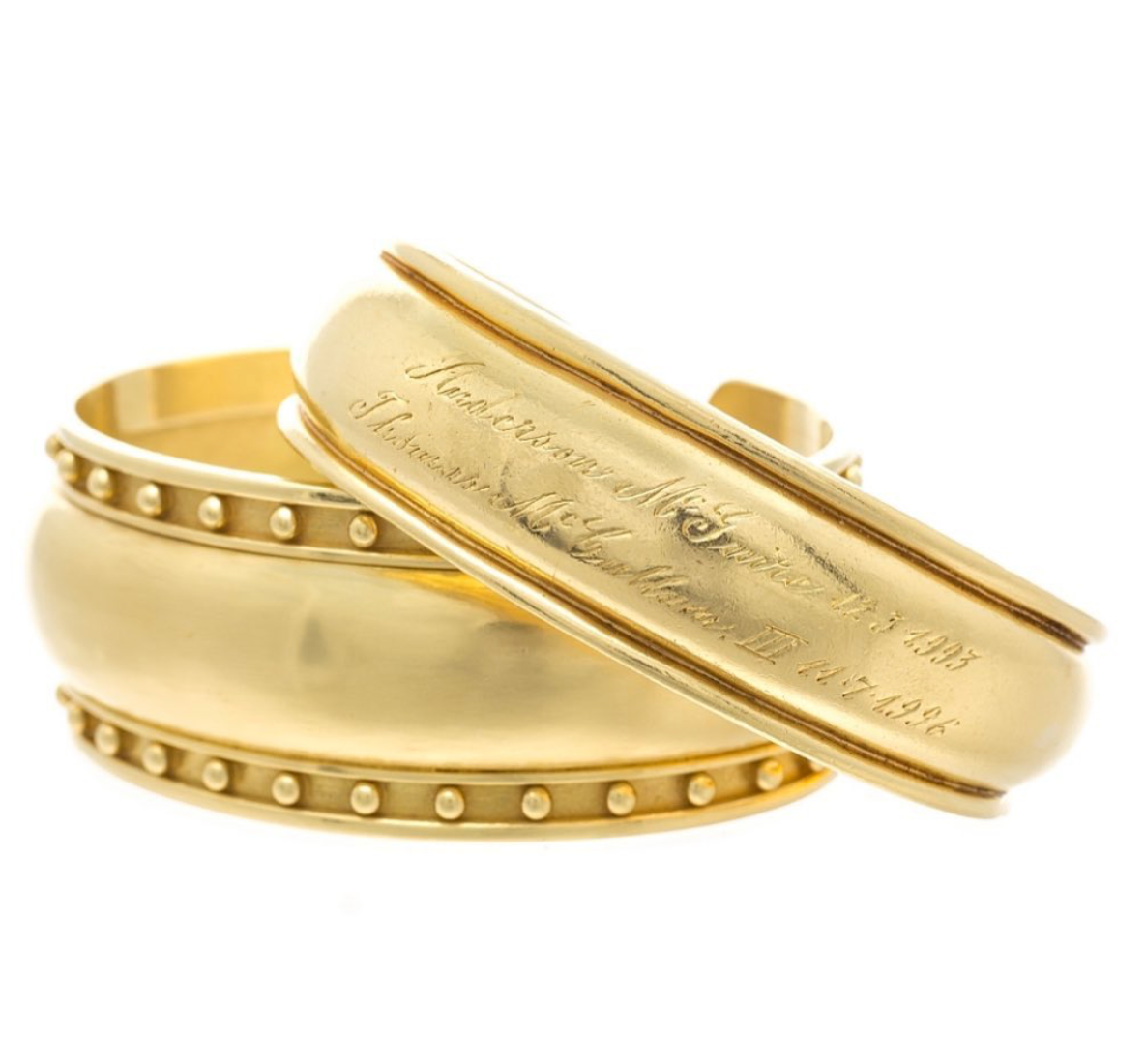 18K yellow gold cuff bracelets designed by Laura Pearce