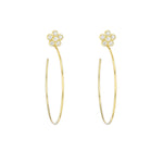 A pair of 18k yellow gold earrings featuring a flower design with all diamond embellishments.