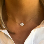 woman wearing a single 18K yellow gold "Anderson" necklace