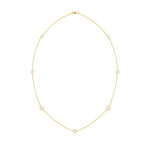 An 18k yellow gold necklace featuring multiple diamond stations set by the yard.