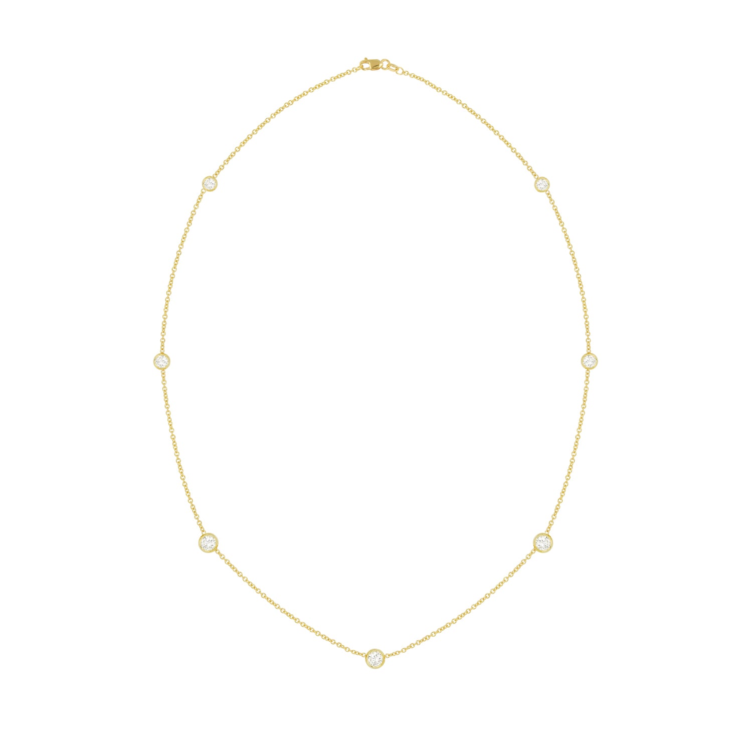 An 18k yellow gold necklace featuring multiple diamond stations set by the yard.