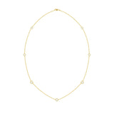 An 18k yellow gold necklace featuring multiple diamond stations set by the yard.