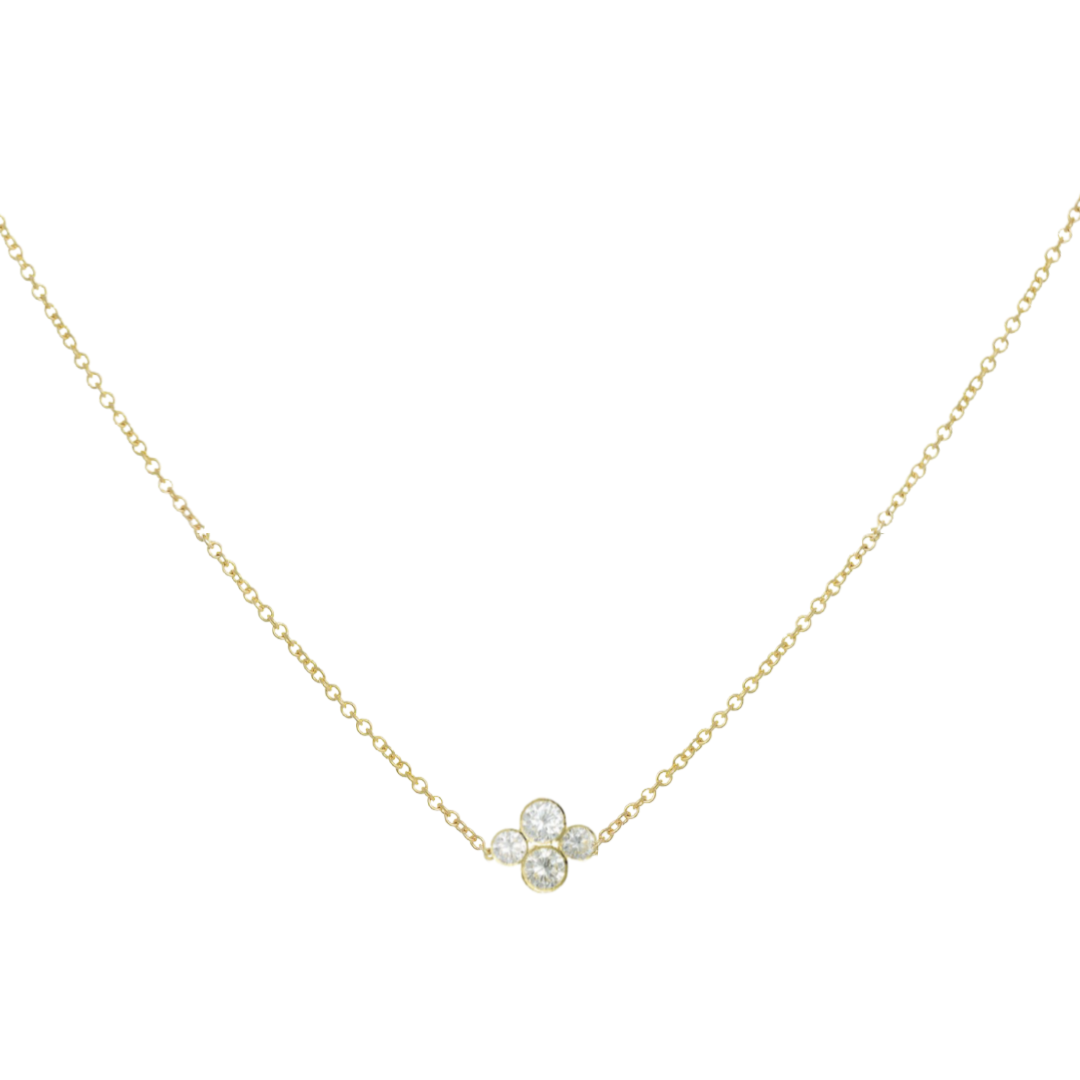 An 18k yellow gold necklace with an Anderson diamond design featuring four diamonds in a cluster