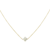 An 18k yellow gold necklace with an Anderson diamond design featuring four diamonds in a cluster