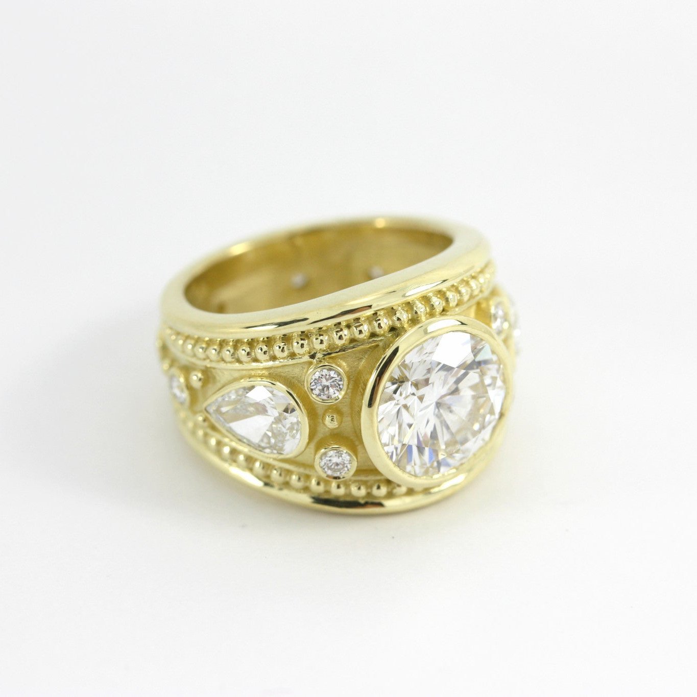 Custom designed 18K gold diamond band ring 