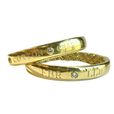 Custom designed 18K gold bracelets engraved with names and initials