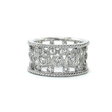 A custom platinum and diamond band with multiple diamonds set in the band.