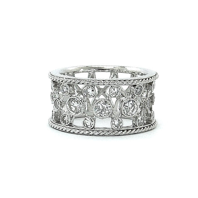 A custom platinum and diamond band with multiple diamonds set in the band.