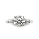 Top View of Custom Platinum Round Brilliant Cut Diamond with Tapered Baguettes on the side 