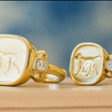 Finn 18k gold rings with dog engravings