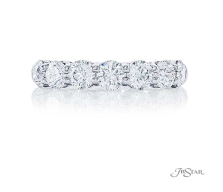 A platinum diamond bandring with multiple round diamonds.