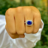 Woman wearing Platinum Sapphire and Diamond Ring designed by Laura Pearce