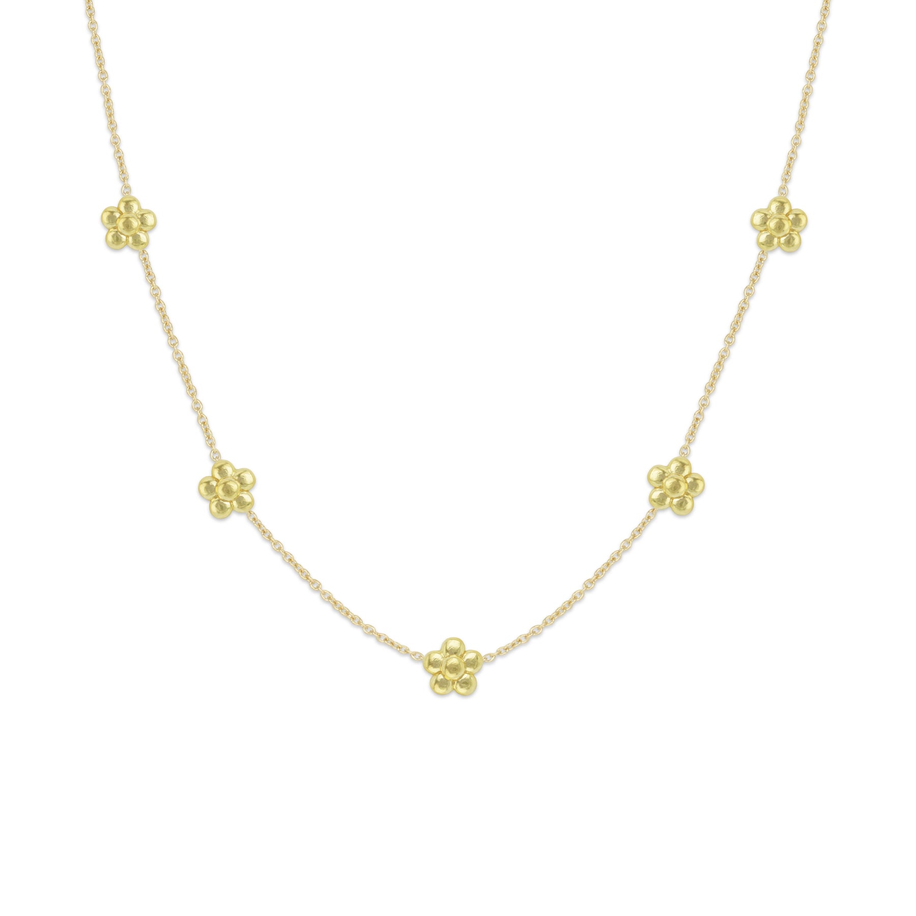 A 18k yellow gold necklace featuring a series of daisy flower stations along the chain.