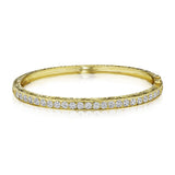 A Penny Preville 18K gold engraved diamond bangle bracelet 