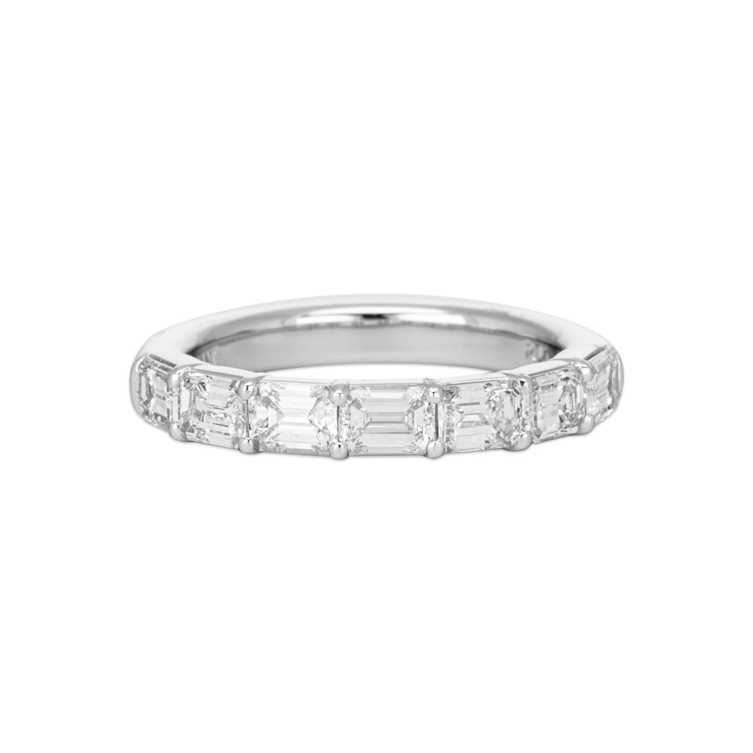 A platinum band featuring seven diamond baguettes arranged in a line.
