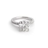 Platinum Round Brilliant Cut Solitaire Diamond Ring with Prong Set Diamond Band