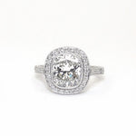 Platinum cushion cut diamond ring custom made by Laura Pearce