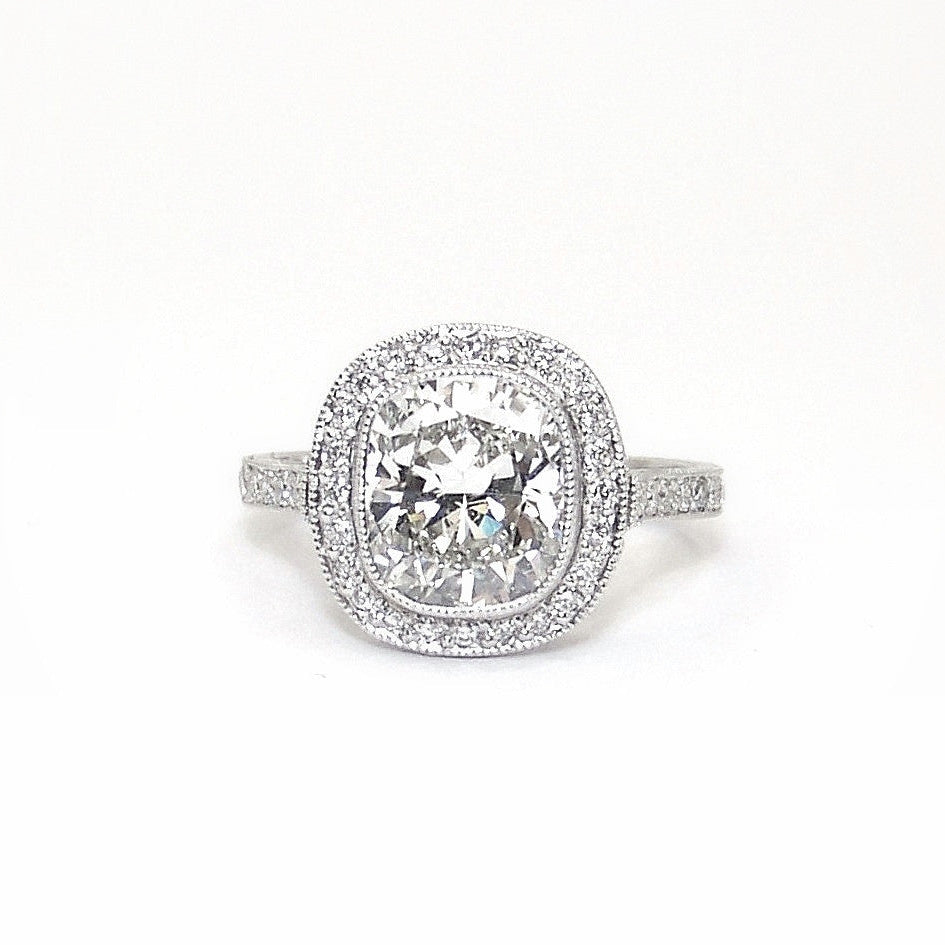 Platinum cushion cut diamond ring custom made by Laura Pearce