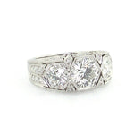 Platinum Art Deco Three Stone Round Diamond Ring laying down