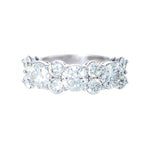 A platinum mixed round brilliant diamond band with multiple diamonds 