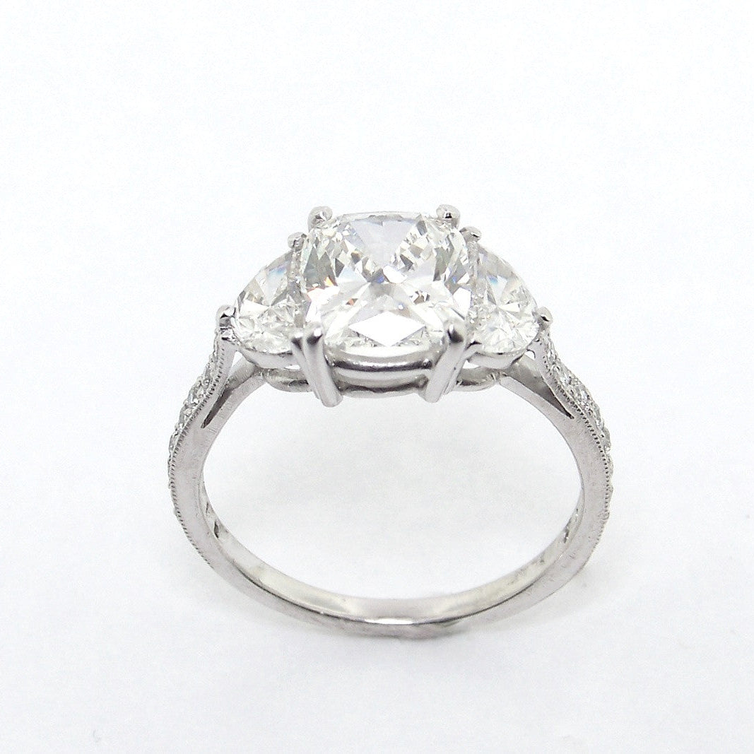 Platinum Cushion Cut Diamond Ring with Half Moon Side Stones