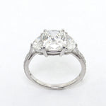 Platinum Cushion Cut Diamond Ring with Half Moon Side Stones