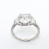 Platinum Cushion Cut Diamond Ring with Half Moon Side Stones