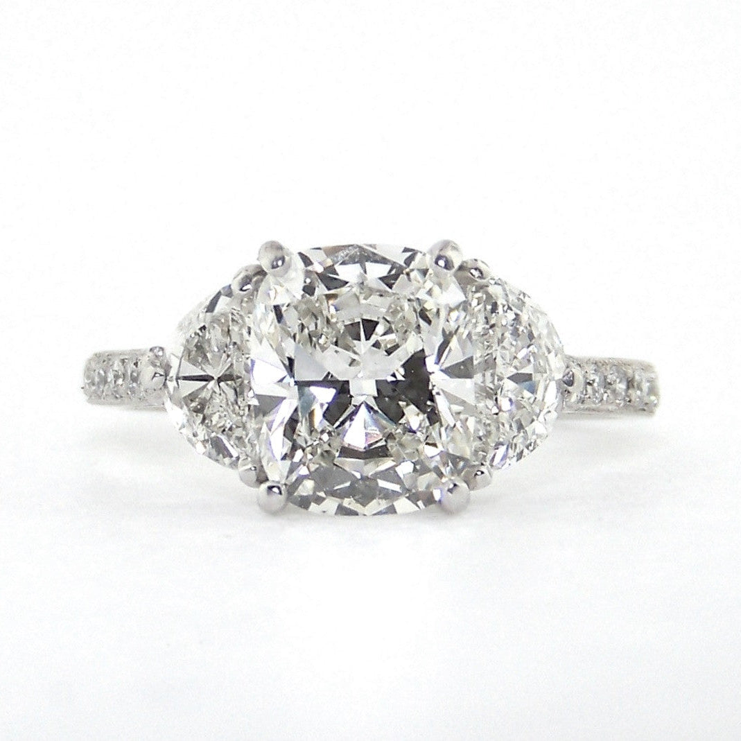 Platinum Cushion Cut Diamond Ring with Half Moon Side Stones