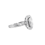 Platinum Cushion Cut Diamond Ring with Pave Halo