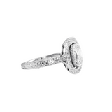 Platinum Cushion Cut Diamond Ring with Pave Halo
