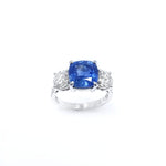 A platinum cushion cut sapphire and diamond ring with a total sapphire weight of 3.8 carats
