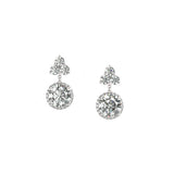 A pair of platinum diamond drop earrings with a round drop diamond