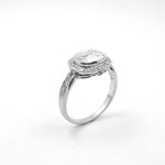 Platinum Emerald Cut Diamond Ring with Oval Diamond Halo
