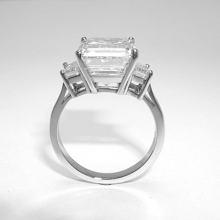 Platinum Emerald Cut Diamond Ring with Side Diamonds