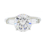 Platinum Round Diamond Engagement Ring with Tapered Baguettes