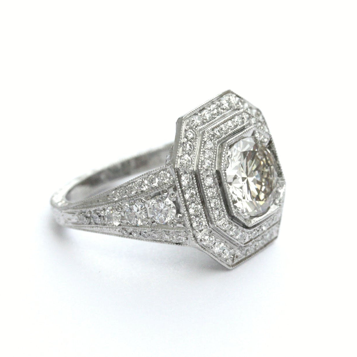 Platinum Round Diamond Ring with Octagonal Halo