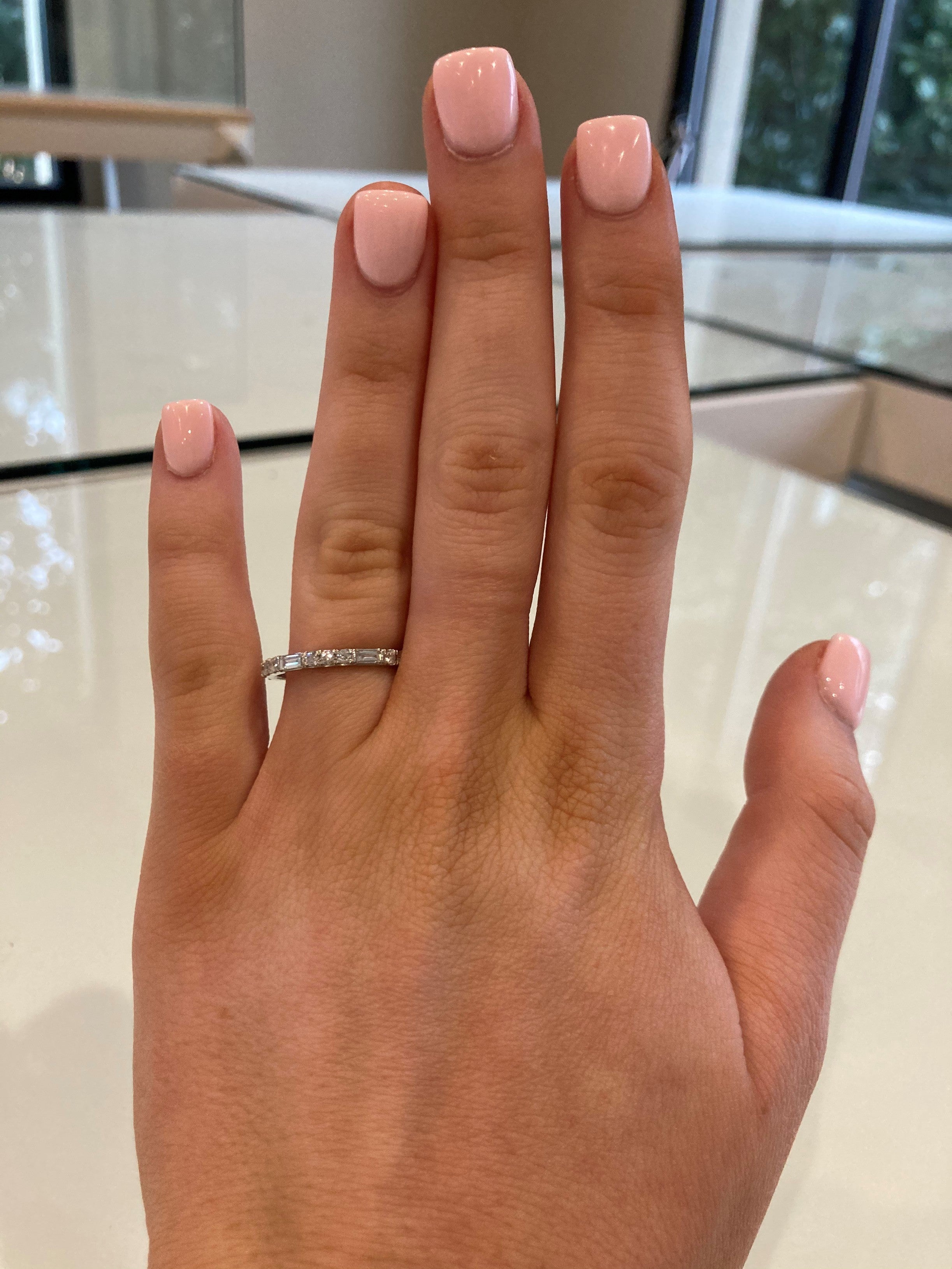 Platinum Round and Baguette Diamond Ring