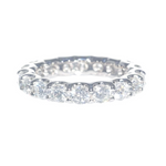 A platinum eternity band ring with shared prong set diamonds 2.4 carats