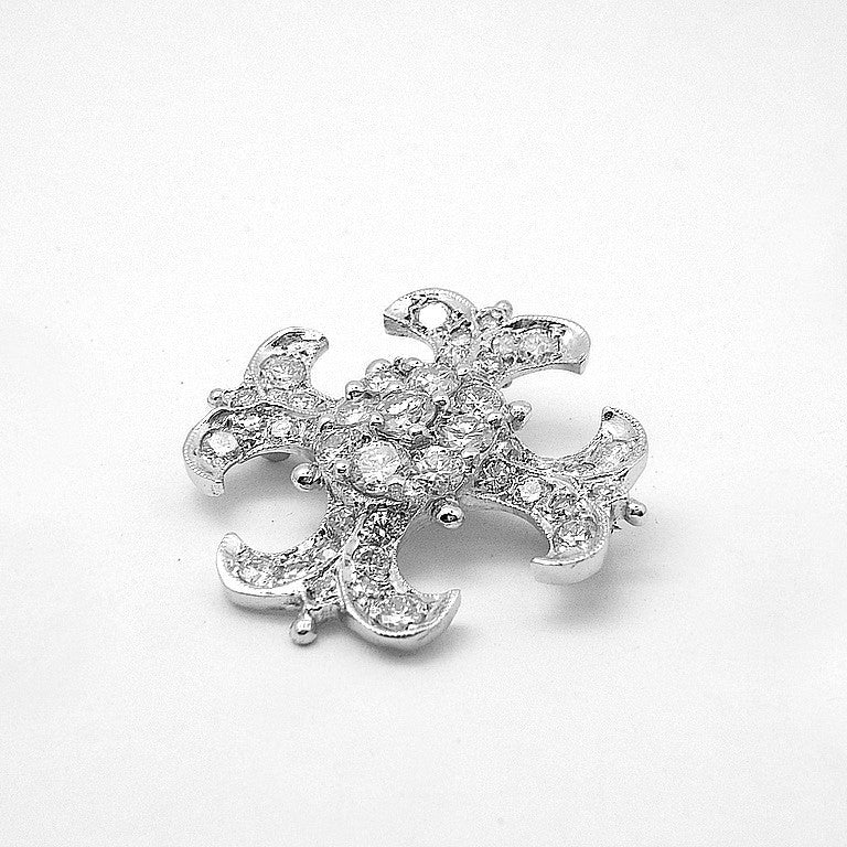 Custom designed platinum and diamond maltese cross pendant