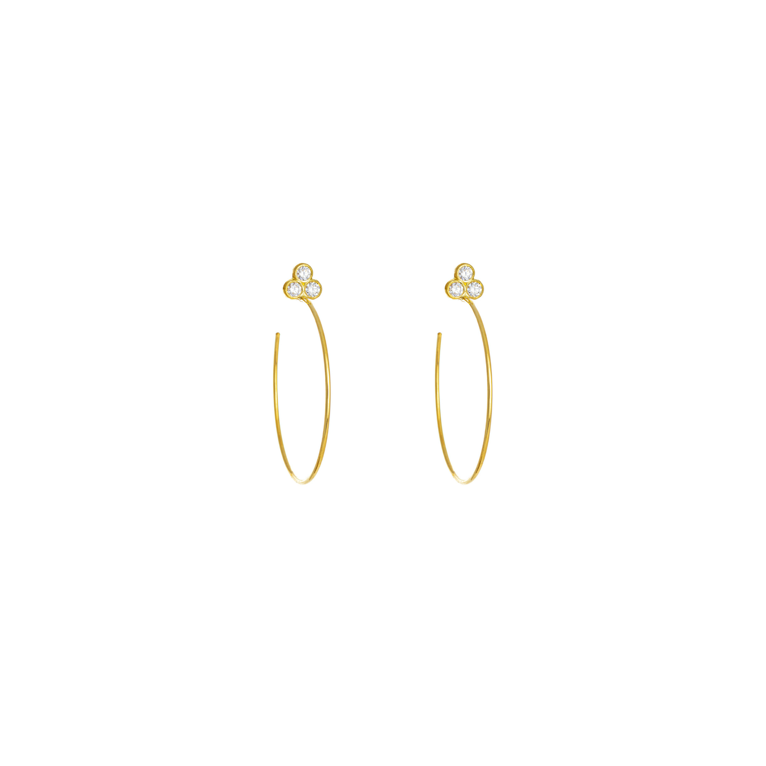 A pair of 18k yellow gold hoop earrings with bezel-set diamonds
