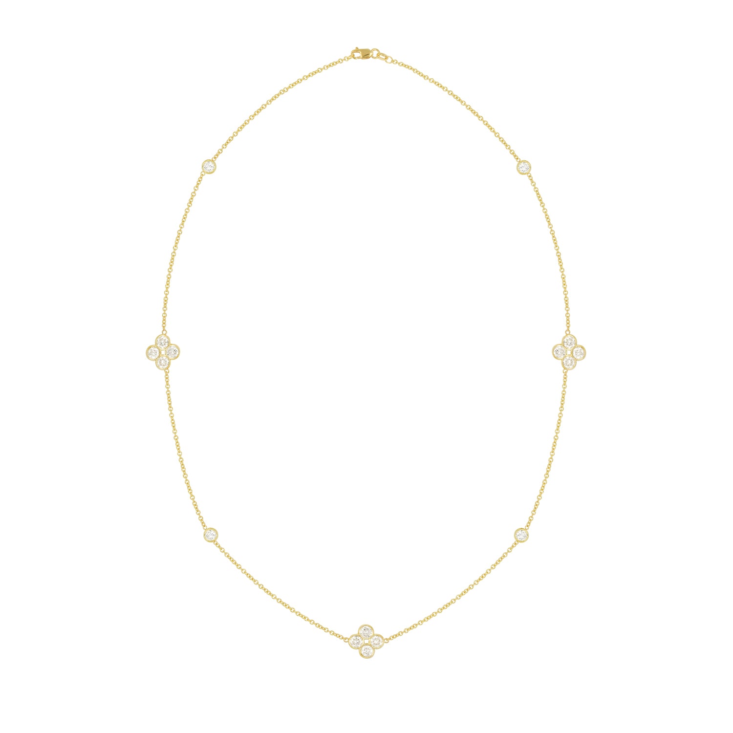An 18k yellow gold necklace with quad diamond stations, approximately 17 inches in length